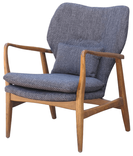 Knitted throw blanket folded on a bed