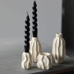 Knitted throw blanket folded on a bed