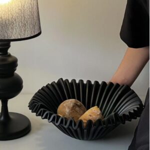 Knitted throw blanket folded on a bed