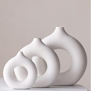 Sculpted candle holder placed on a coffee table