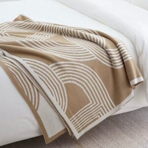 Sculpted candle holder placed on a coffee table