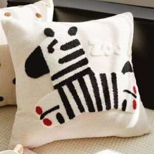 Sculpted candle holder placed on a coffee table