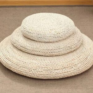 Neutral-toned decorative pillows on a sofa