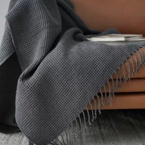 Neutral-toned decorative pillows on a sofa